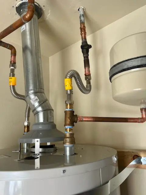 Water heater installation and plumbing repair in Dolley